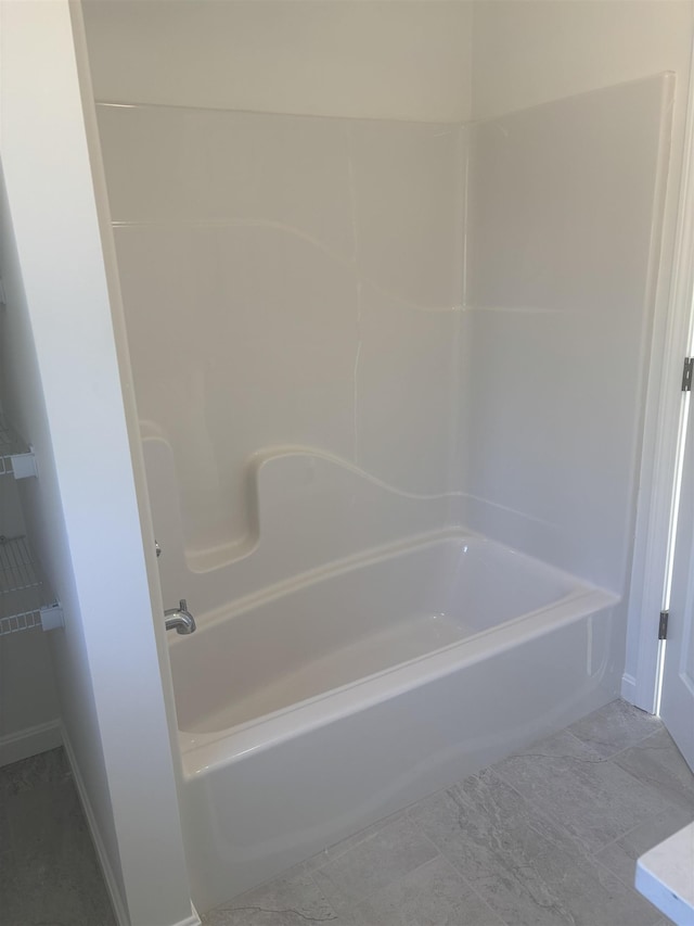 full bath featuring shower / bathtub combination