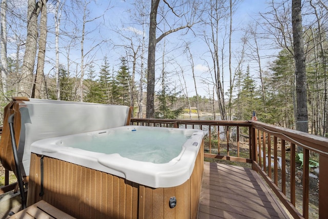 deck featuring a hot tub