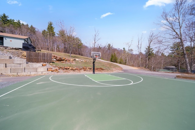view of sport court featuring fence and community basketball court