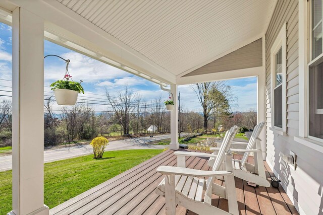 104 Pease Rd, Meredith, NH 03253 - deck featuring a porch and a yard