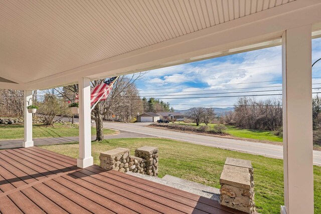 104 Pease Rd, Meredith, NH 03253 - wooden terrace featuring a porch and a lawn