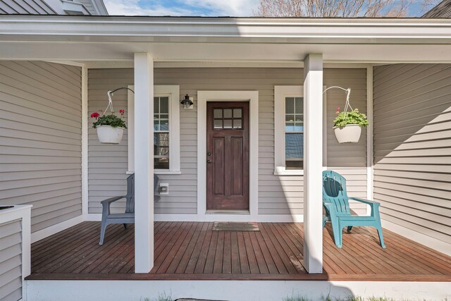 104 Pease Rd, Meredith, NH 03253 - property entrance with covered porch