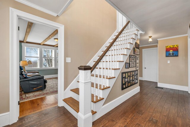104 Pease Rd, Meredith, NH 03253 - stairway with crown molding, baseboards, hardwood / wood-style flooring, and visible vents