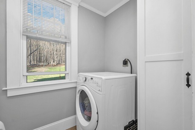104 Pease Rd, Meredith, NH 03253 - laundry room featuring baseboards, ornamental molding, laundry area, and washer / clothes dryer