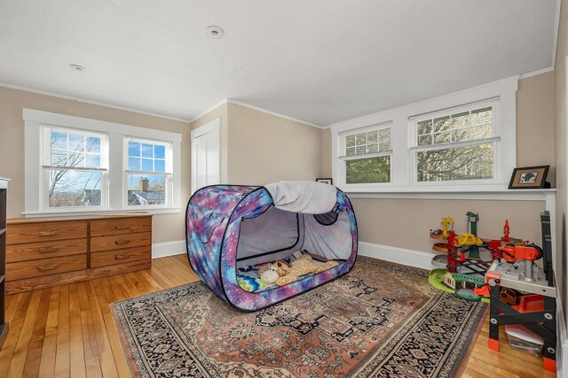 104 Pease Rd, Meredith, NH 03253 - bedroom with crown molding, baseboards, and hardwood / wood-style floors