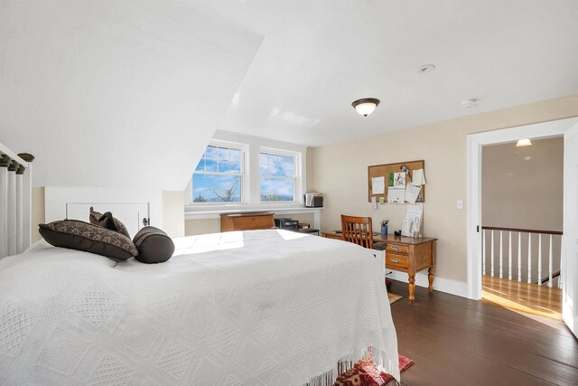 104 Pease Rd, Meredith, NH 03253 - bedroom with dark wood finished floors