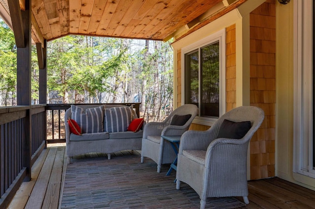 wooden deck with outdoor lounge area
