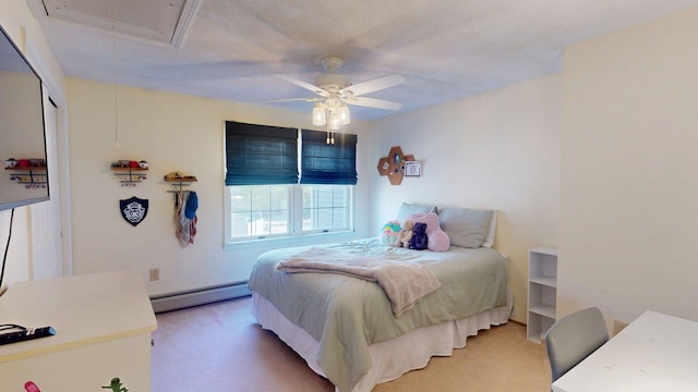 bedroom with a ceiling fan, light carpet, a baseboard heating unit, and attic access