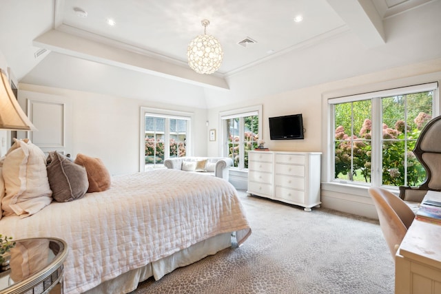 bedroom with an inviting chandelier, multiple windows, light colored carpet, and visible vents