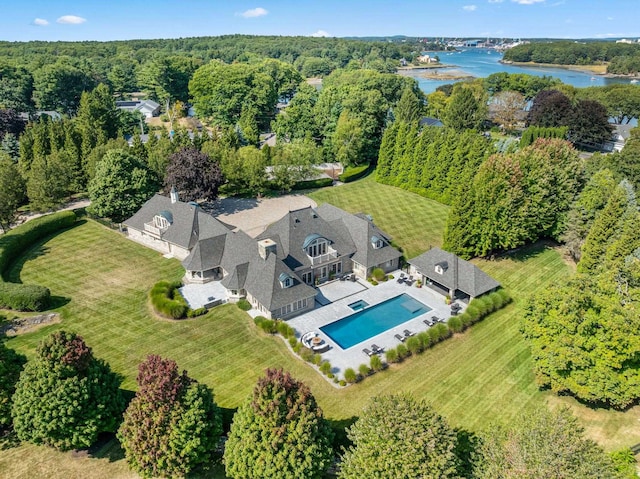 birds eye view of property featuring a water view