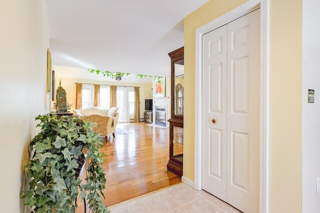 hallway featuring light wood-style flooring