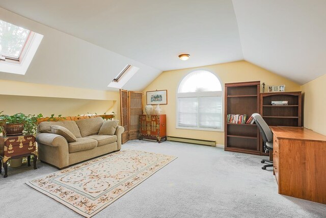carpeted home office featuring a baseboard heating unit and lofted ceiling with skylight