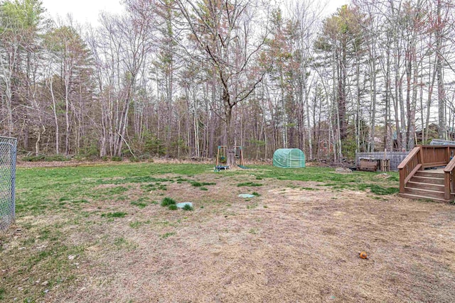 view of yard with a wooden deck
