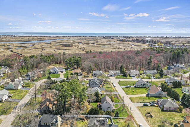 bird's eye view with a water view and a residential view