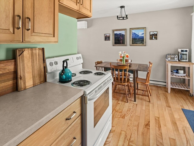 kitchen featuring light countertops, a baseboard heating unit, light wood-type flooring, and white electric range