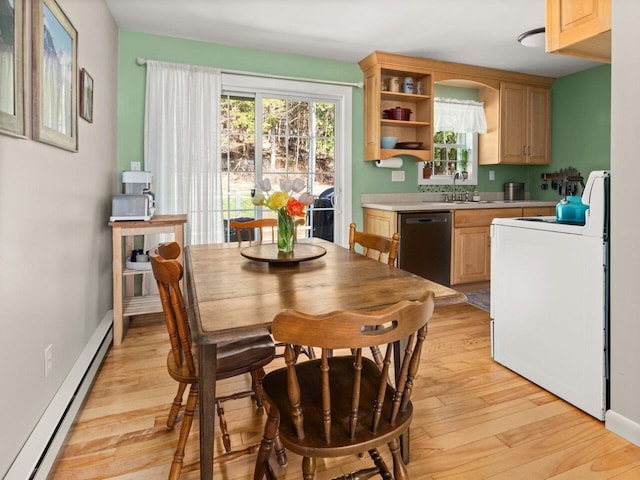 kitchen with electric range, baseboard heating, light wood finished floors, dishwasher, and light countertops