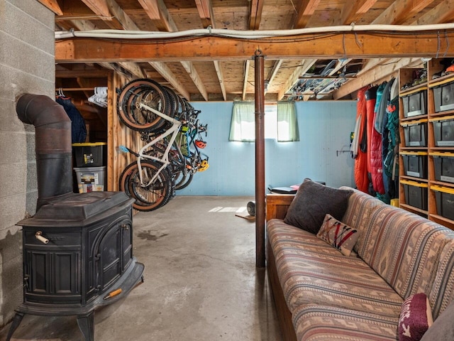 below grade area featuring a wood stove
