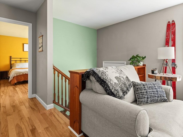 living room featuring baseboards and wood finished floors