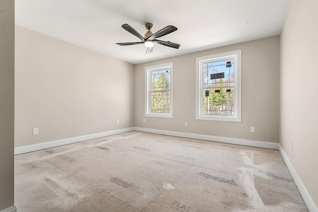 unfurnished room featuring baseboards and a ceiling fan