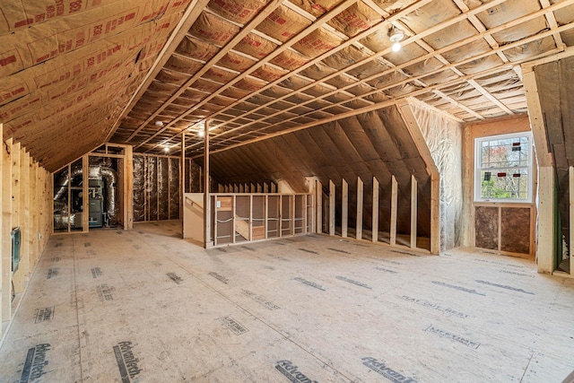 attic featuring an upstairs landing