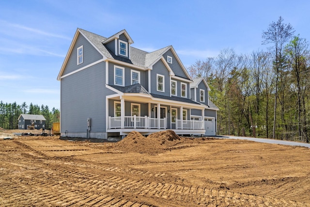 craftsman inspired home with a porch and a garage