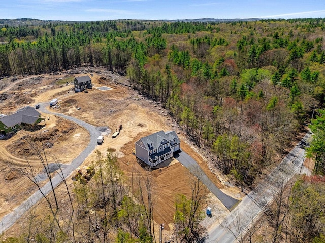 bird's eye view with a forest view