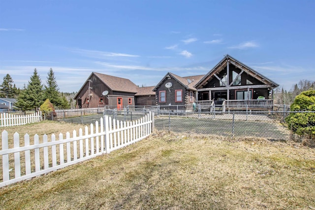 view of front of house with a fenced backyard