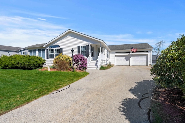 single story home with roof with shingles, driveway, and a front lawn