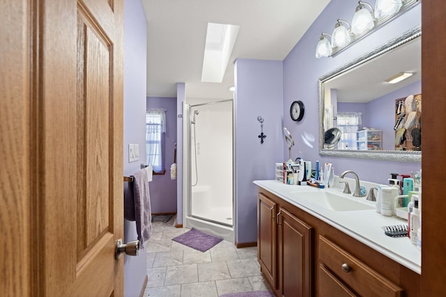 full bathroom with vanity and a shower stall