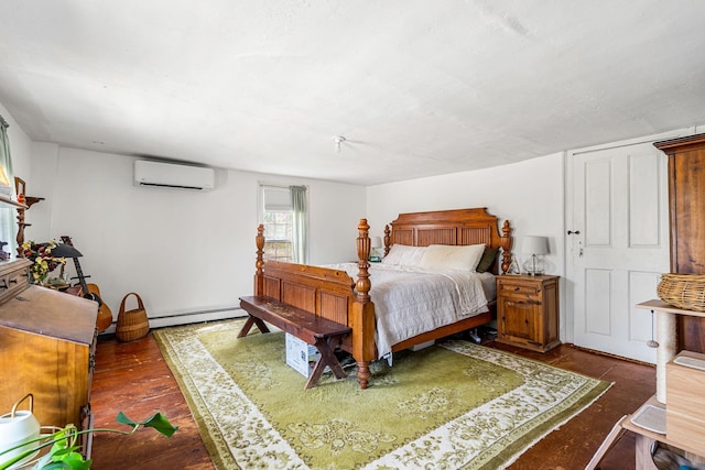 bedroom featuring wood-type flooring, a baseboard heating unit, and a wall unit AC