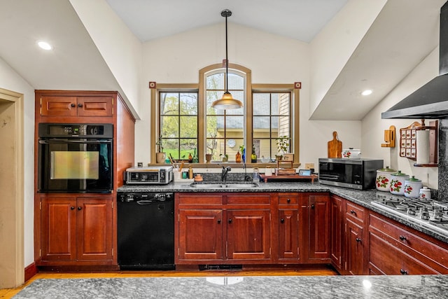 kitchen featuring a sink, black appliances, wall chimney exhaust hood, and lofted ceiling