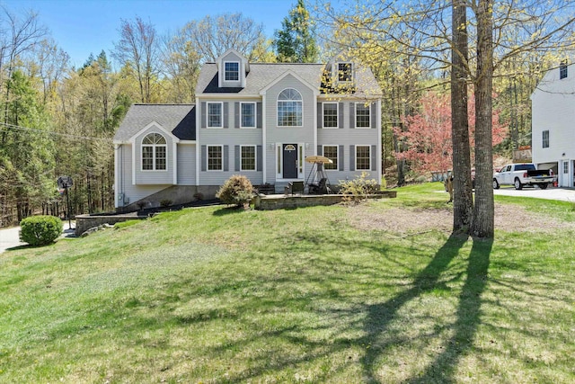 view of front of house with a front lawn