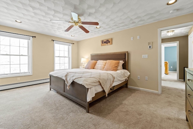 bedroom featuring recessed lighting, baseboards, light colored carpet, and baseboard heating