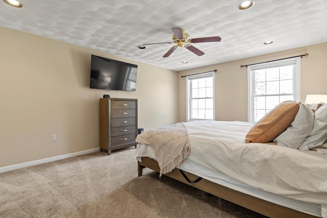 bedroom featuring recessed lighting, baseboards, light carpet, and ceiling fan