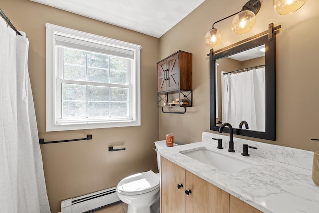 bathroom with vanity, a baseboard radiator, and toilet