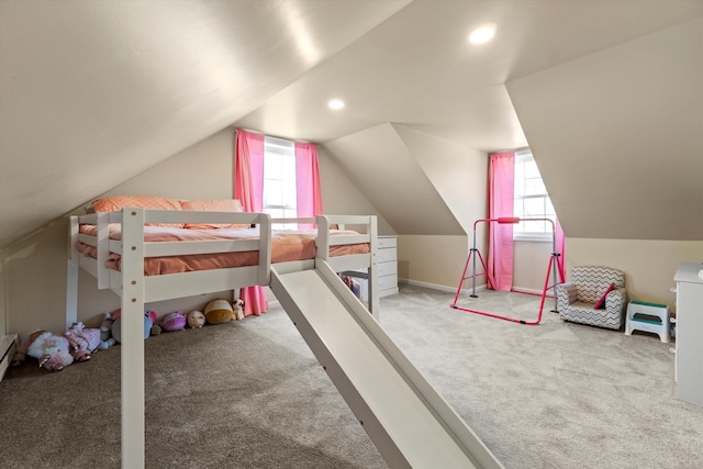 unfurnished bedroom featuring carpet floors, vaulted ceiling, and recessed lighting