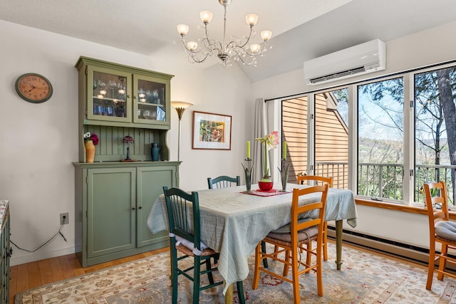 dining space with lofted ceiling, a wall mounted air conditioner, a baseboard heating unit, light wood-style flooring, and a notable chandelier
