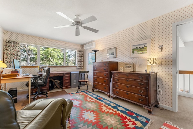 office space with an AC wall unit, carpet floors, and wallpapered walls