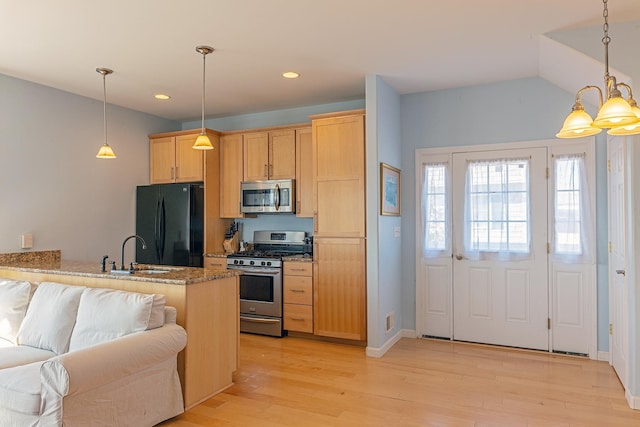 35 Glade Path, Hampton, NH 03842 - kitchen featuring appliances with stainless steel finishes, light wood-style floors, recessed lighting, open floor plan, and a sink