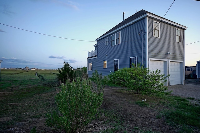 35 Glade Path, Hampton, NH 03842 - view of home's exterior featuring a garage and driveway