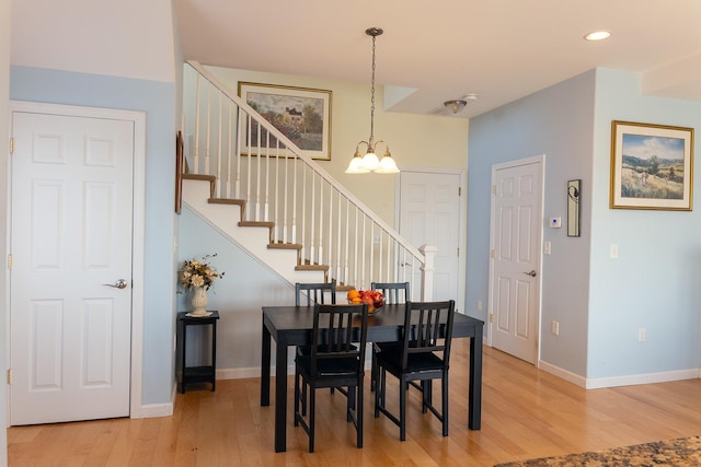35 Glade Path, Hampton, NH 03842 - dining area featuring light wood finished floors, a chandelier, stairs, recessed lighting, and baseboards