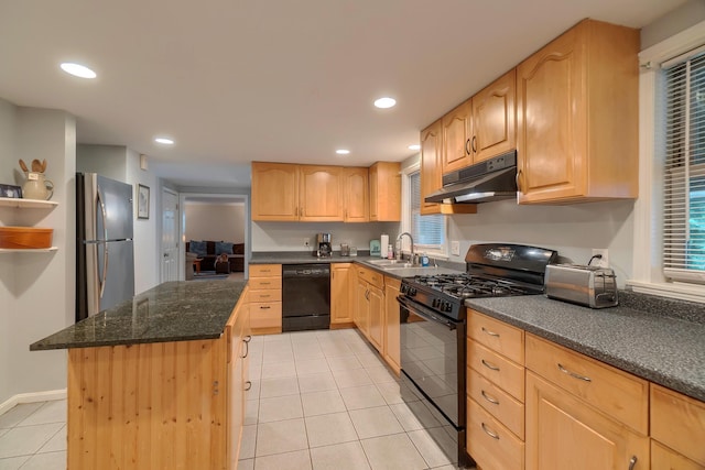 kitchen with light brown cabinetry, under cabinet range hood, a sink, light tile patterned floors, and black appliances