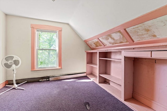 bonus room with carpet flooring and vaulted ceiling