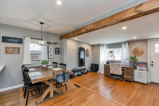 dining room with light wood-style floors and recessed lighting