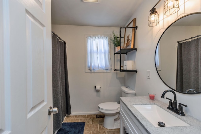 full bath with visible vents, vanity, baseboards, tile patterned floors, and toilet