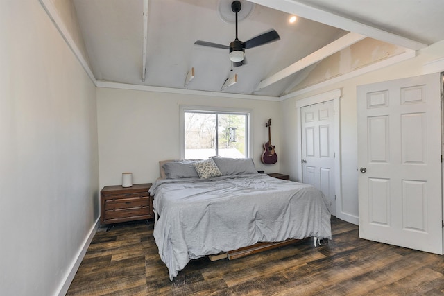 bedroom featuring baseboards, a ceiling fan, dark wood-style flooring, and lofted ceiling