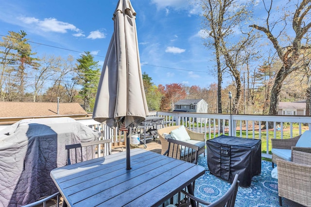 wooden deck with outdoor lounge area and outdoor dining area