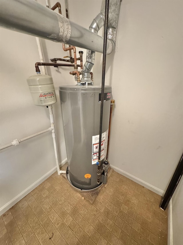 utility room featuring gas water heater