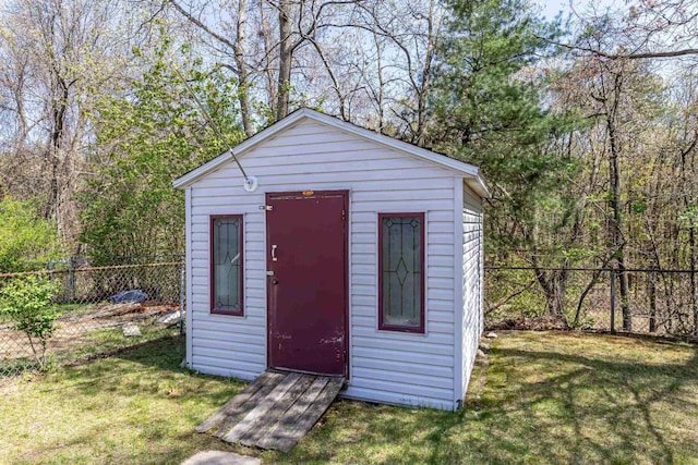 view of shed featuring a fenced backyard