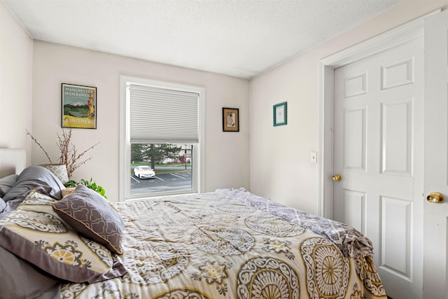 bedroom featuring a textured ceiling
